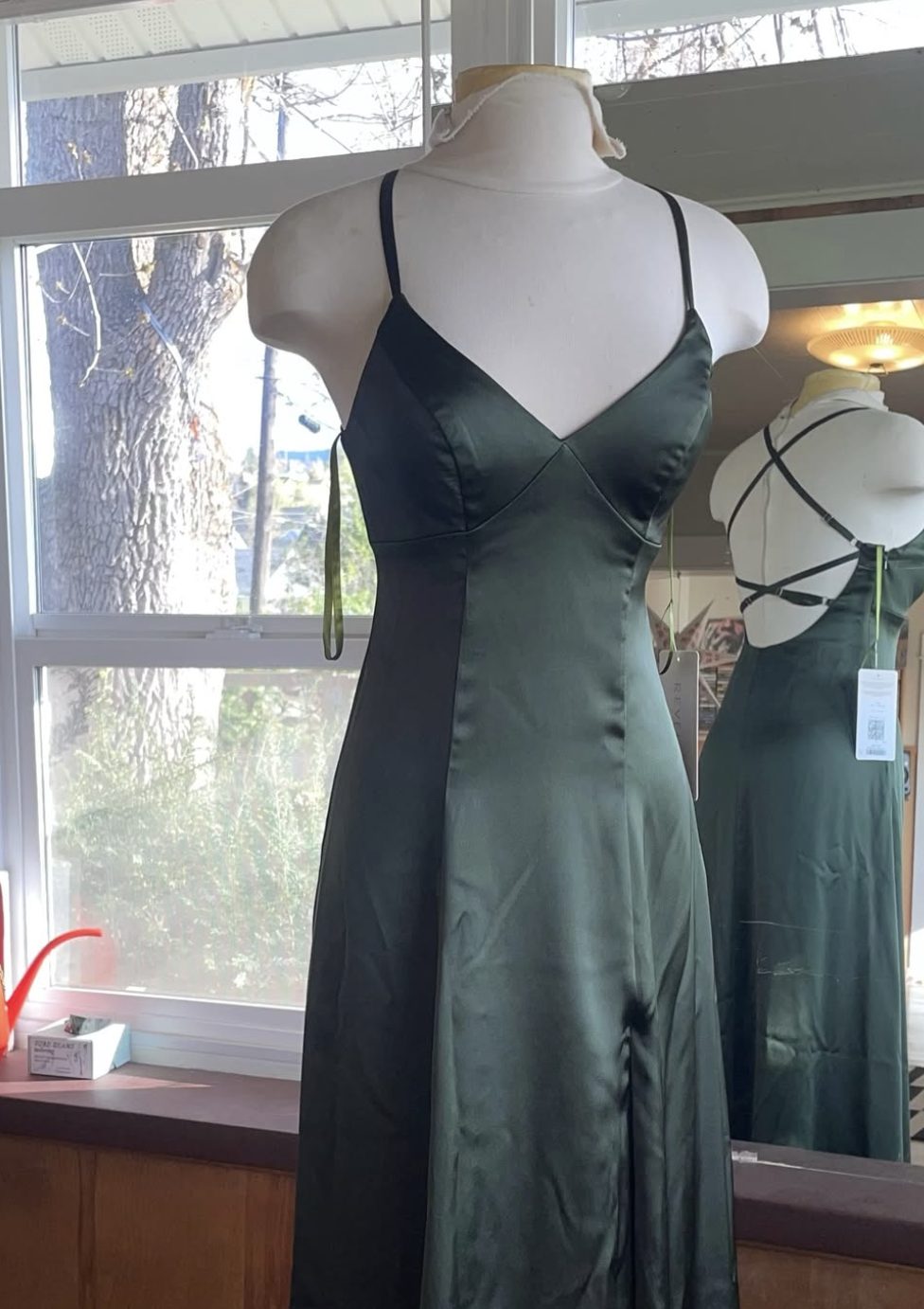 Deep green satin slip dress with bias seams